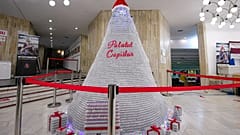 The 3-metre tall Christmas tree is made from 19,000 empty COVID-19 vaccine containers  