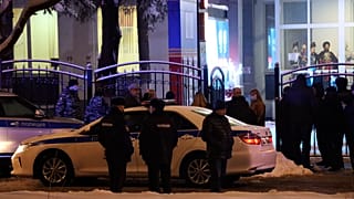 Police guard an area near the Moscow government services centre.
