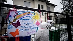 Tributes have been left in front of the family home in Koenigs Wusterhausen.
