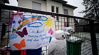 Tributes have been left in front of the family home in Koenigs Wusterhausen.
