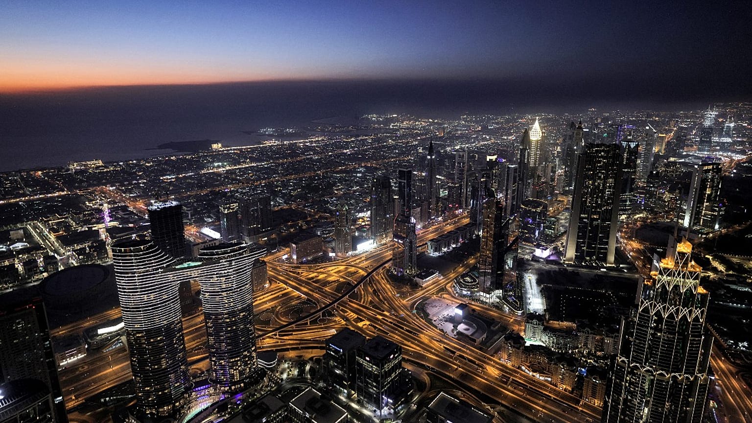 This picture taken on May 9, 2021 shows a view of the Dubai city skyline as seen from the Burj Khalifa
