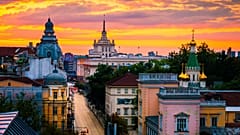 The sun sets over a boulevard in Sofia