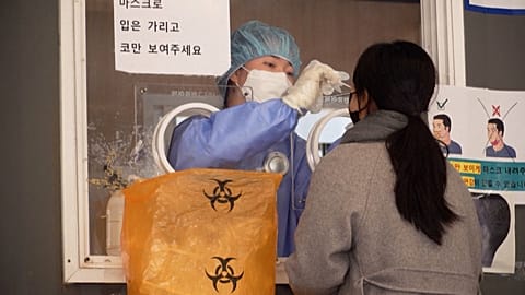 Person receives COVID-19 test in Seoul, South Korea.