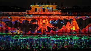 A photograph taken on December 8, 2021 shows the modern art museum illuminated on the "Les Terreaux" square during the Festival of Lights (Fete des Lumieres), in Lyon.