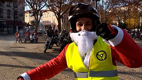 Bikers dressed up as Santa Claus parade to raise donations for those in need