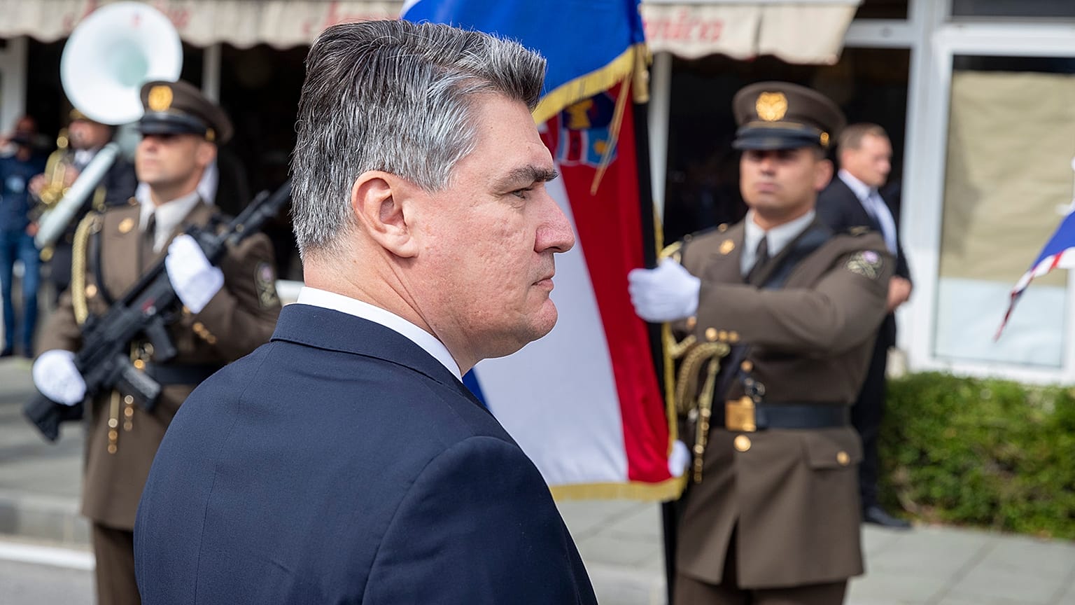 Croatia's President Zoran Milanović reviews the honour guards as he arrives at a ceremony in Knin, Croatia, Wednesday, Aug. 5, 2020