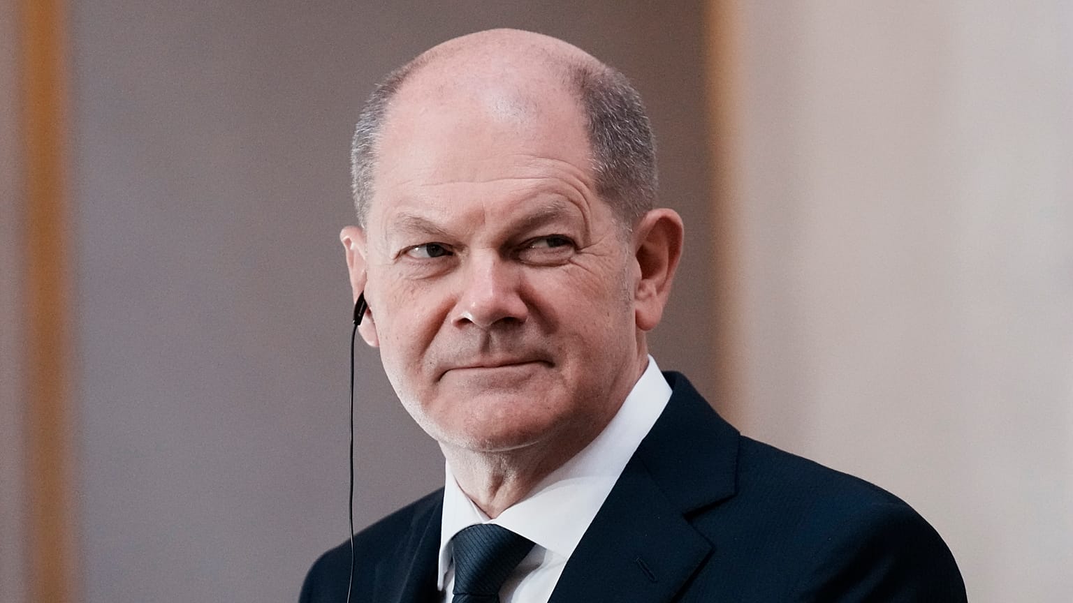 German Chancellor Olaf Scholz attends a media conference with French President Emmanuel Macron at the Elysee Palace in Paris, Friday, Dec. 10, 2021