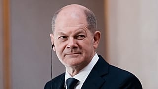 German Chancellor Olaf Scholz attends a media conference with French President Emmanuel Macron at the Elysee Palace in Paris, Friday, Dec. 10, 2021