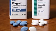 This Monday, Dec. 4, 2017 photo shows Pfizer's Viagra, left, and the company's generic version, sildenafil citrate, at Pfizer Inc., headquarters in New York.