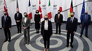 G7 foreign ministers, pose in a socially distanced manner for a group photo at the Museum of Liverpool, Liverpool, England, Saturday Dec. 11, 2021.