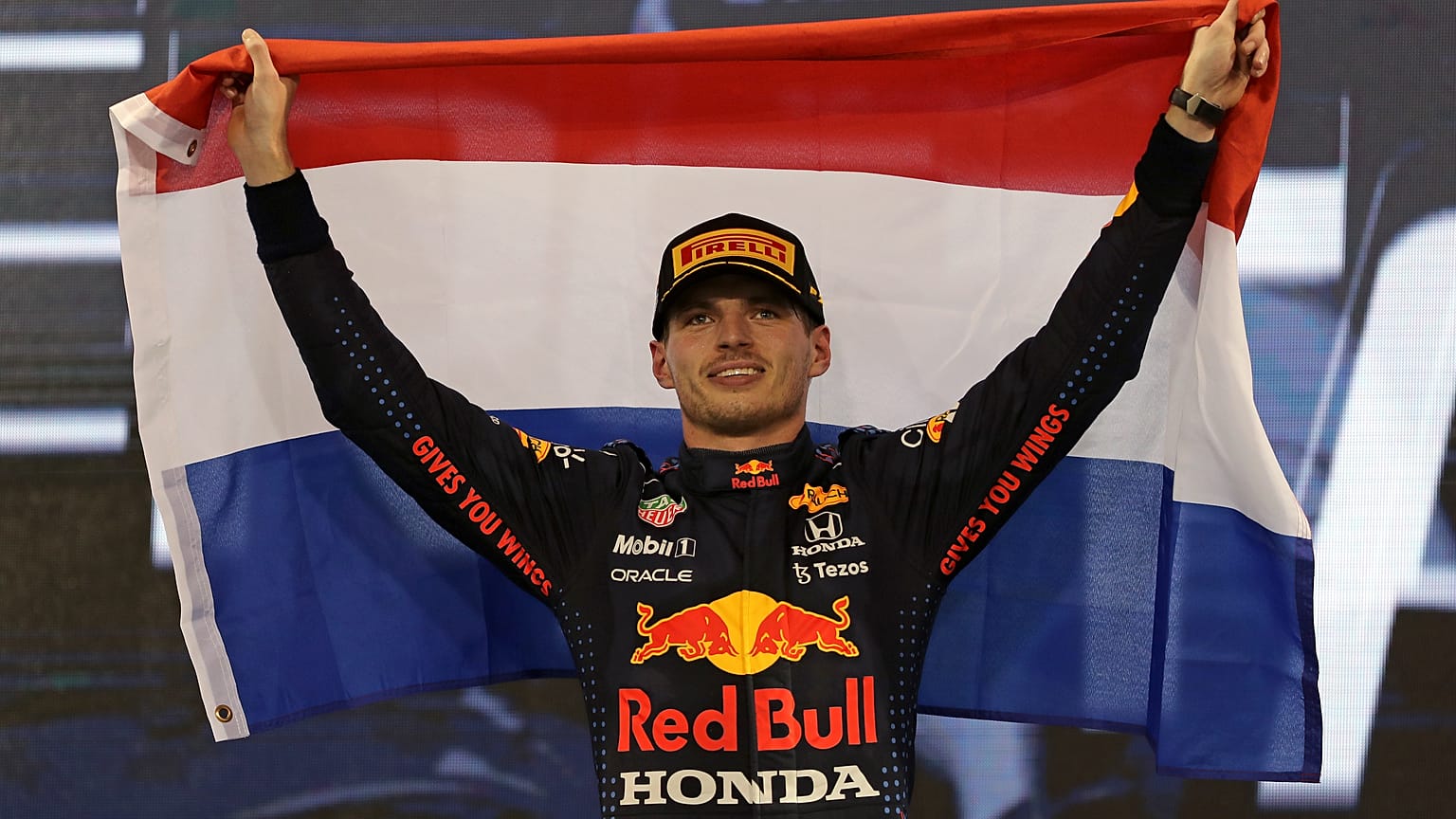 Red Bull driver Max Verstappen of the Netherlands celebrates on the podium after becoming F1 drivers world champion
