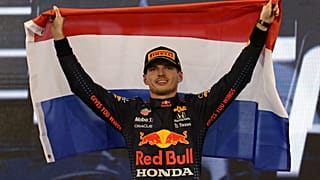 Red Bull driver Max Verstappen of the Netherlands celebrates on the podium after becoming F1 drivers world champion