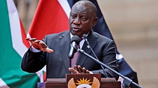 South African President Cyril Ramaphosa addresses the media after meeting with his Kenyan counterpart Uhuru Kenyatta in Pretoria, South Africa, Tuesday Nov. 23, 2021.