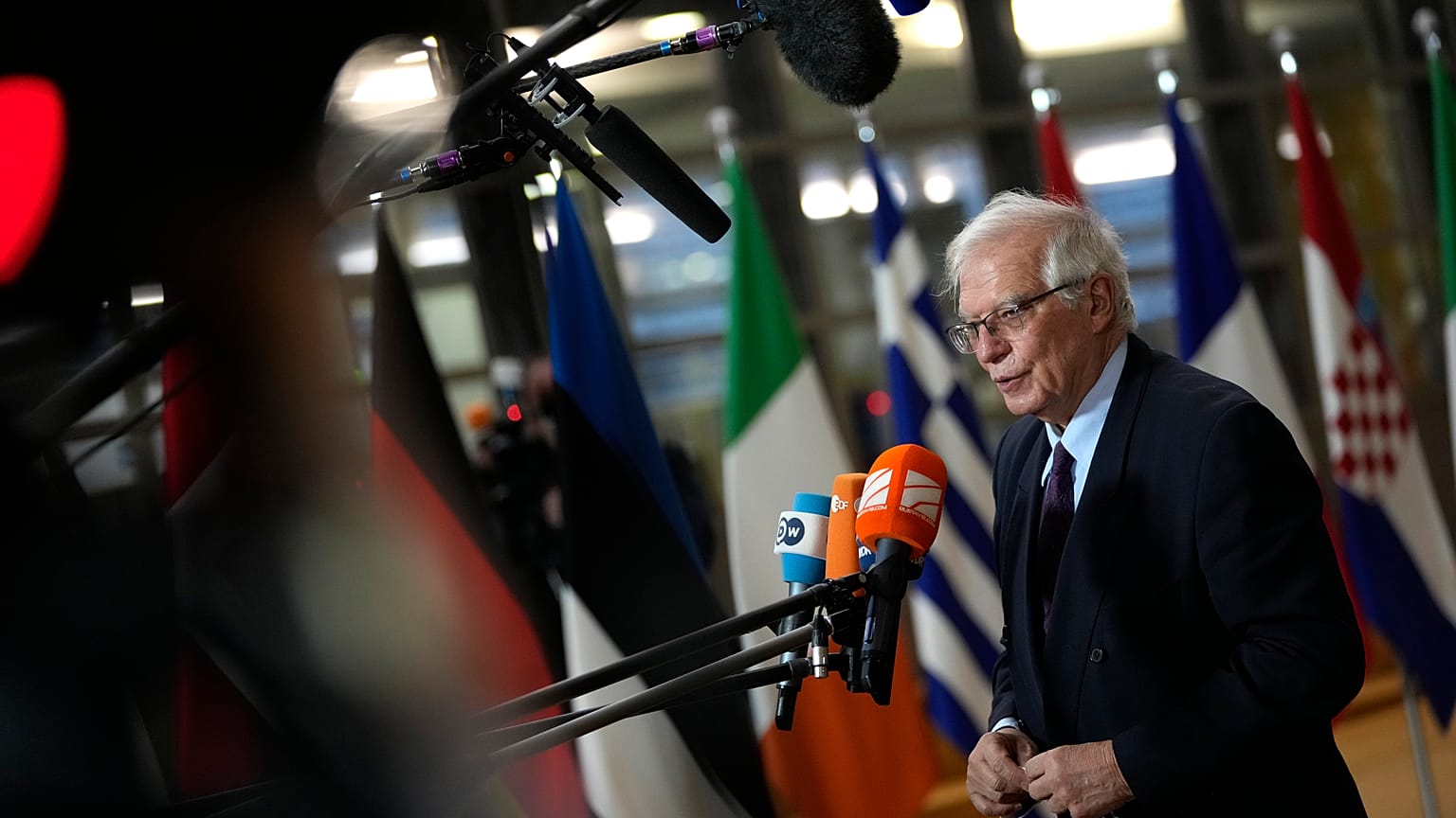 EU foreign policy chief Josep Borrell speaks with the media as he arrives for a meeting of EU foreign ministers at the European Council building in Brussels on Dec. 13, 2021.