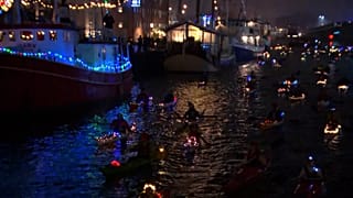 Festive kayaks in Santa Lucia procession on Copenhagen canals