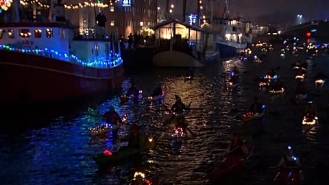 Festive kayaks in Santa Lucia procession on Copenhagen canals
