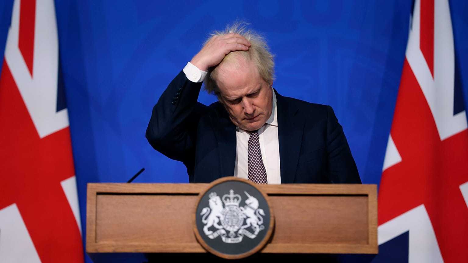 Britain's Prime Minister Boris Johnson gestures as he speaks during a press conference on the coronavirus pandemic in London, Saturday November 27, 2021.
