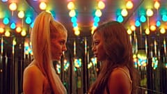 This image released by A24 shows Riley Keough, left, and Taylour Paige in a scene from "Zola." 