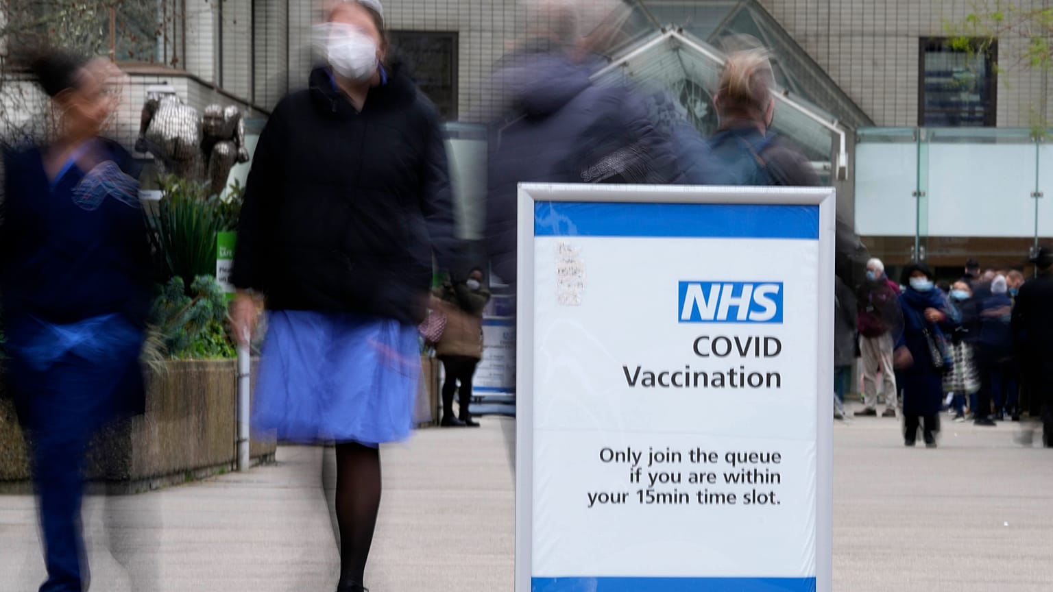 A sign marks the entrance of a vaccination centre at St Thomas' Hospital in London, Wednesday, Dec. 15, 2021.