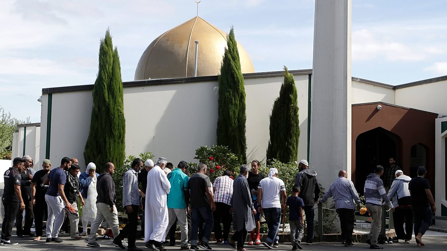 In this March 23, 2019 file photo, worshippers prepare to enter the Al Noor mosque following the previous week's mass shooting in Christchurch, New Zealand. 