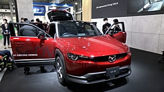 The modified MX-30 Self-empowerment SUV allows people with disabilities to drive solely with their hands