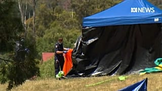 Emergency crews work at the scene after five children killed when a bouncy castle was thrown into the air due to wind.