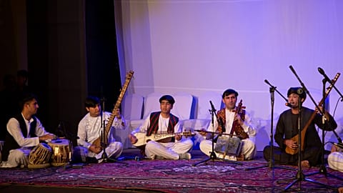 Afghanistan National Institute of Music performing at a refugee camp in Doha, Qatar
