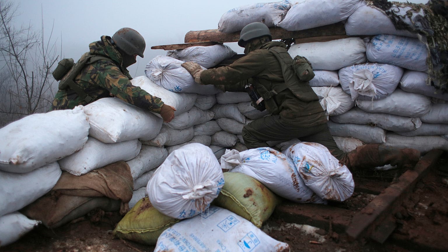 Ukrainian soldiers strengthen their front line position in the town of Novoluhanske in the Donetsk region, Ukraine, on Dec. 9, 2019.