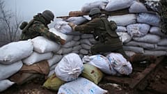 Ukrainian soldiers strengthen their front line position in the town of Novoluhanske in the Donetsk region, Ukraine, on Dec. 9, 2019.