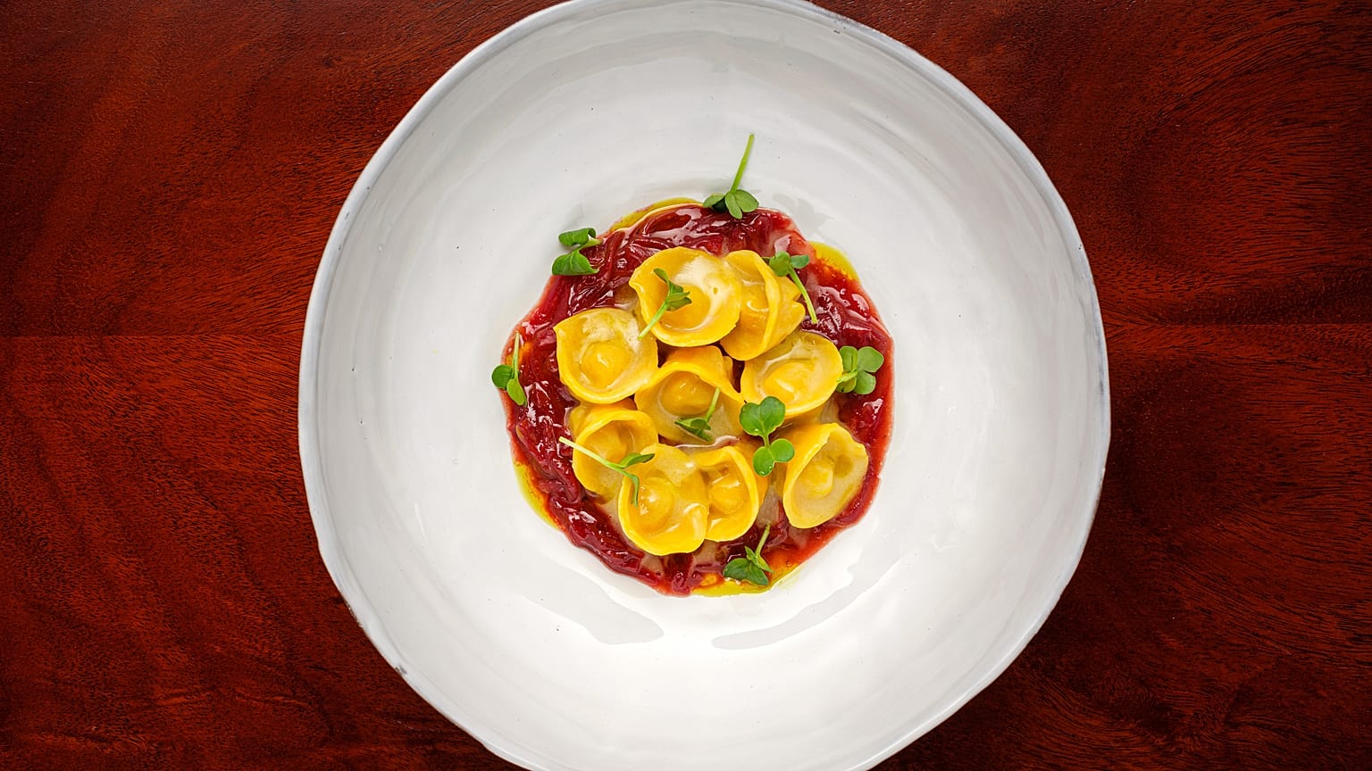 homemade Tortelli stuffed wiith tuscan roast pork & Taurasi red onion, by Fabios