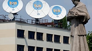 FILE - Warsaw headquarters of Poland's TVN broadcaster that is owned by the U.S. company Discovery Inc., in Warsaw, Poland, July 2021.