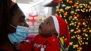 Édesanya gyermekével Johannesburgban, Dél-Afrikában