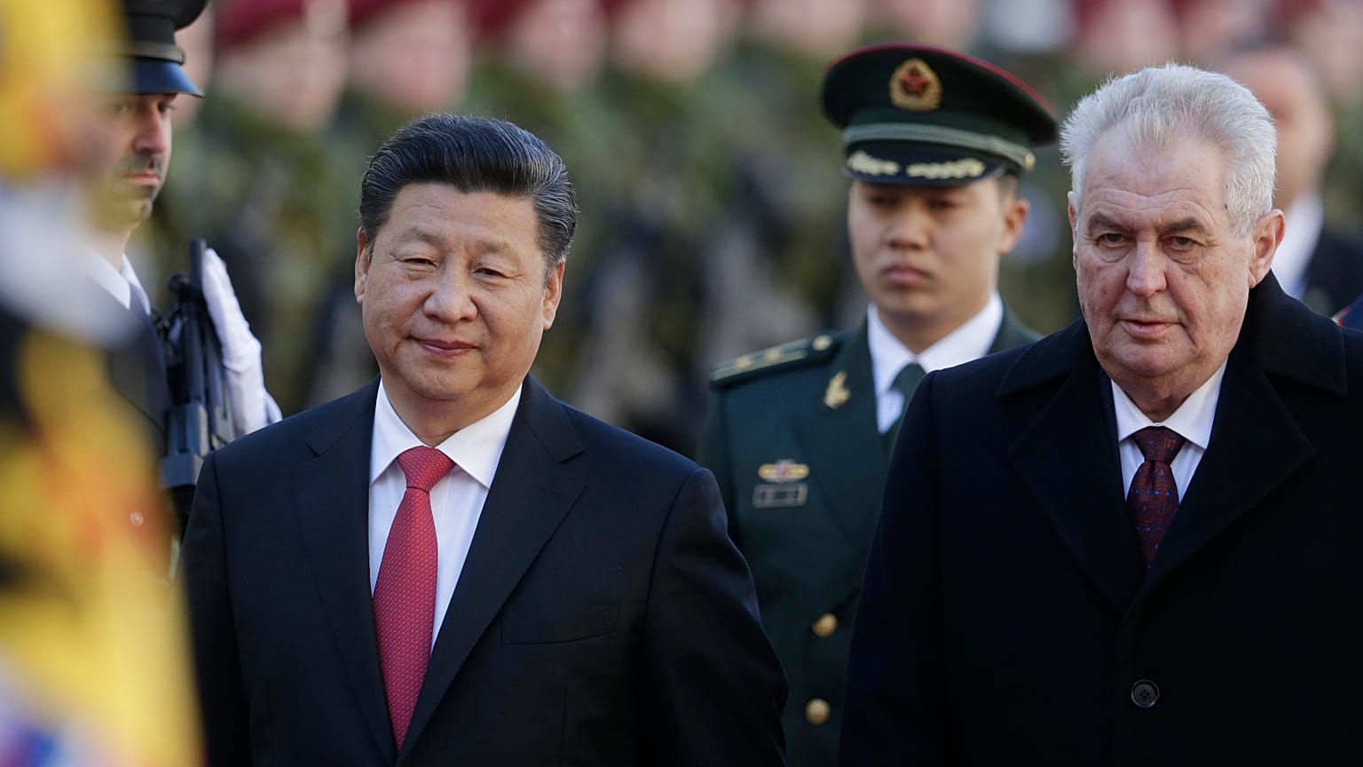 Czech Republic's President Milos Zeman, right, welcomes his Chinese counterpart Xi Jinping, left, at the Prague Castle in Prague, Czech Republic, Tuesday, March 29, 2016