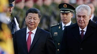 Czech Republic's President Milos Zeman, right, welcomes his Chinese counterpart Xi Jinping, left, at the Prague Castle in Prague, Czech Republic, Tuesday, March 29, 2016