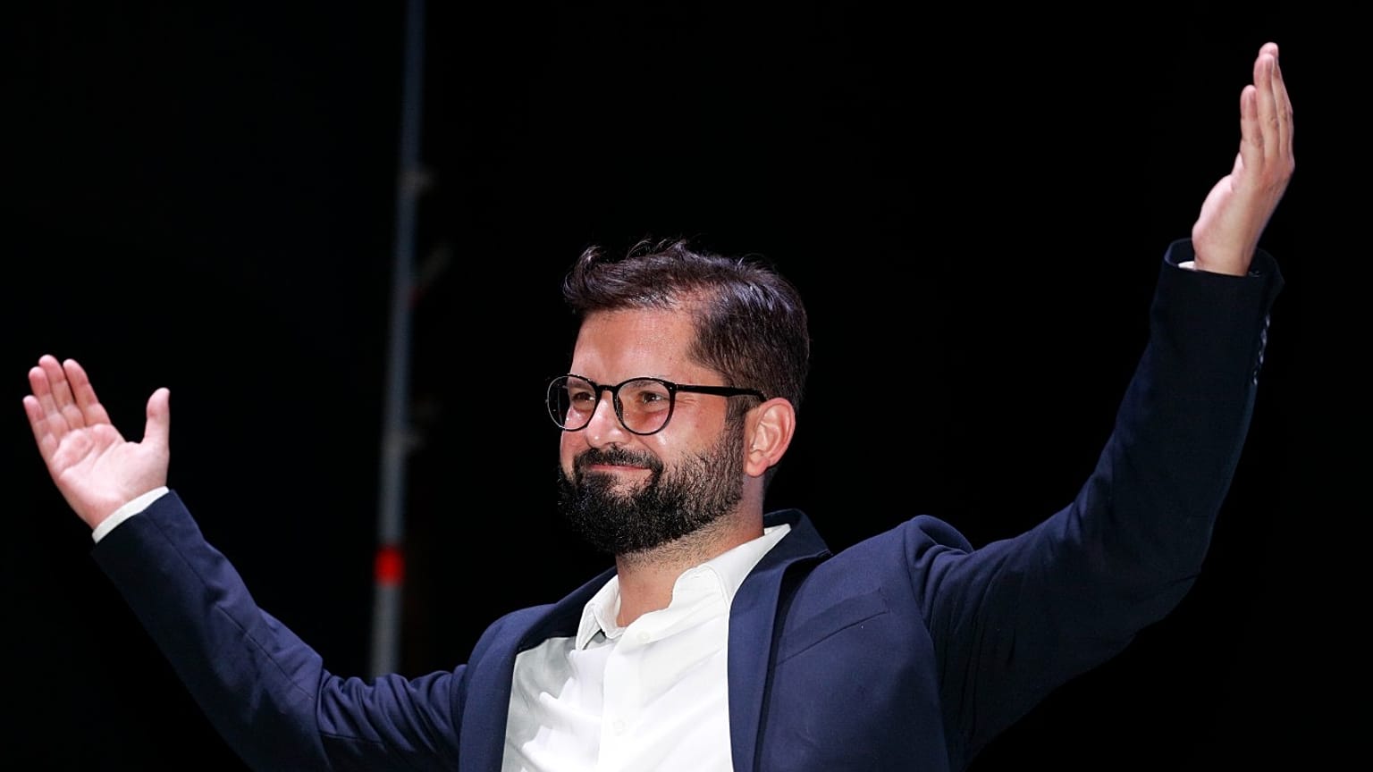 Chile's President elect Gabriel Boric, of the "I approve Dignity" coalition, celebrates his victory in the presidential run-off election  in Santiago, Chile, Dec. 19, 2021.
