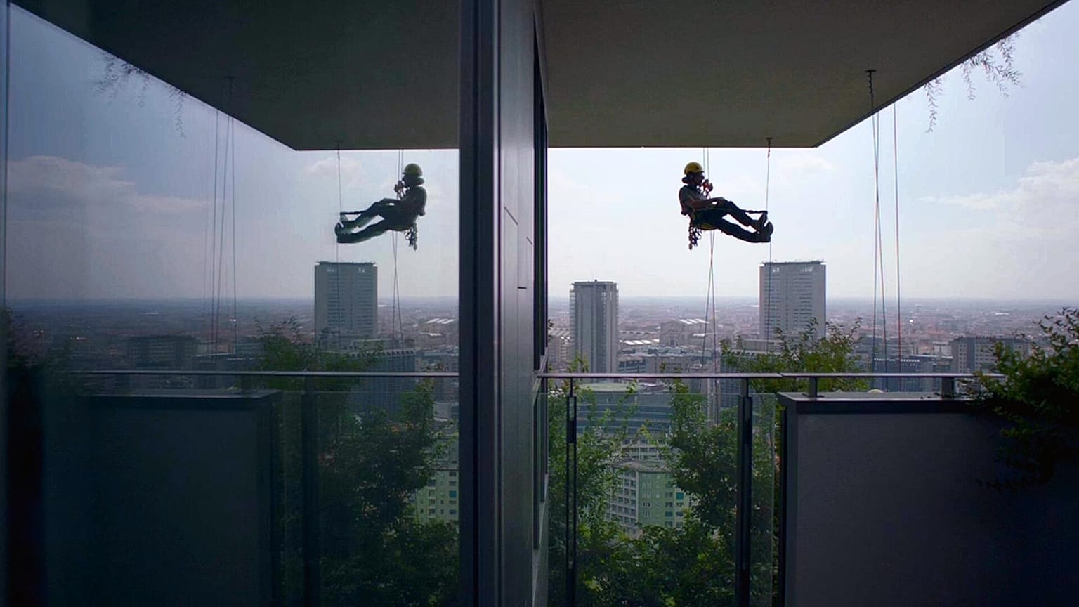 Flying Gardeners descend from the top of Bosco Verticale once every three months to tend to over 21,000 trees, plants and shrubs