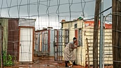 A woman living in the Vlakfontein informal settlement outside Johannesburg, South Africa