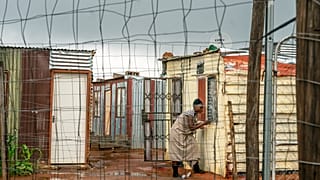 A woman living in the Vlakfontein informal settlement outside Johannesburg, South Africa