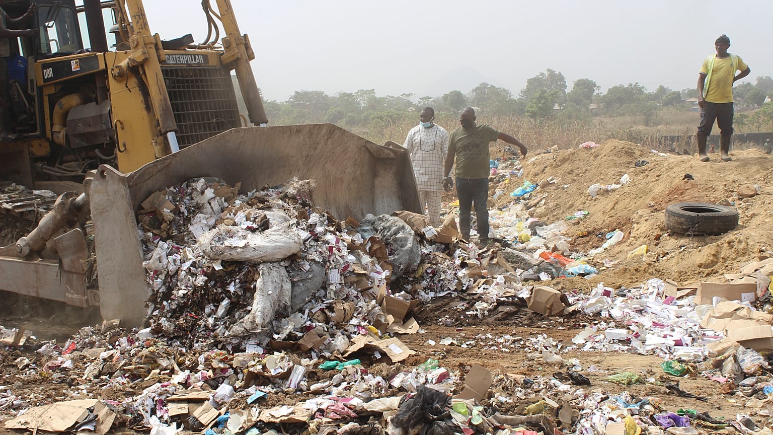 Expired COVID-19 vaccines are being destroyed by government officials in Abuja, Nigeria. Wednesday, Dec. 22, 2021. 