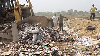 Expired COVID-19 vaccines are being destroyed by government officials in Abuja, Nigeria. Wednesday, Dec. 22, 2021.