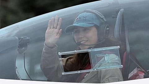Flying solo, 19-year-old woman takes off on round-the-world record bid.  