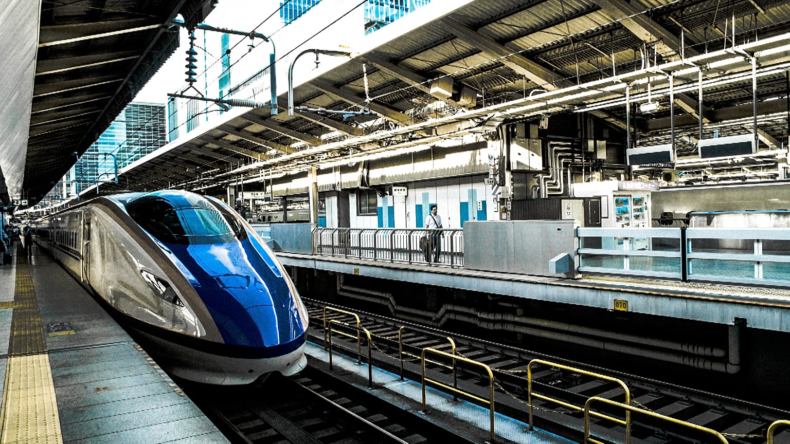 Image shows a high speed train entering a train station. The EU has committed to simplifying transport and rail travel across the bloc.