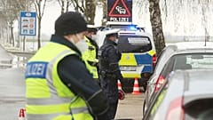 Federal police officers stop cars coming from the Netherlands for an inspectional near the border at the Horbach district in Aachen, Germany, April 6, 2021. 