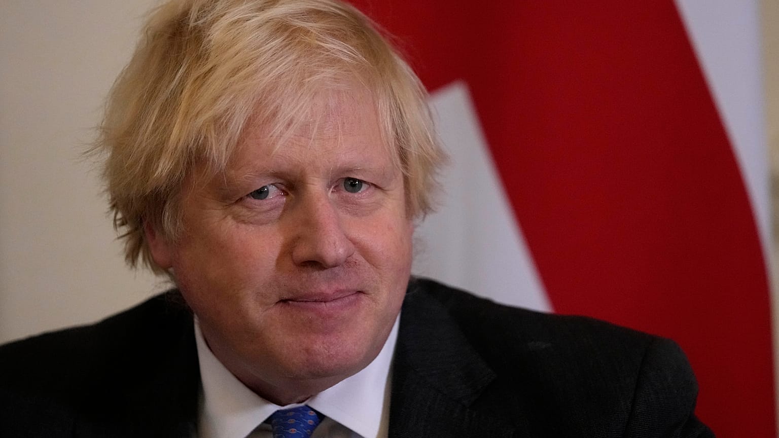 British Prime Minister Boris Johnson watches journalists as he welcomes the Sultan of Oman, Haitham Bin Tarik Al Said, to 10 Downing Street in London, Dec. 16, 2021.