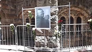 Tutus portrait in front of Cape Town's  St. George's Anglican cathedral 
