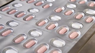 his image provided by Pfizer in October 2021 shows the company's COVID-19 Paxlovid pills. Newly infected COVID-19 patients have two new treatment options that can be taken at