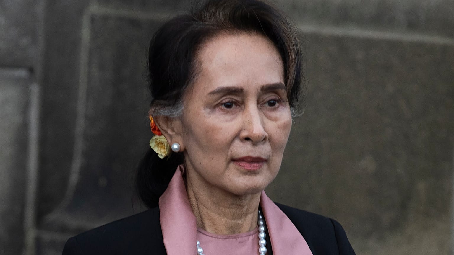 Myanmar's leader Aung San Suu Kyi leaves the International Court of Justice after the first day of three days of hearings in The Hague, Netherlands on Dec. 10, 2019.