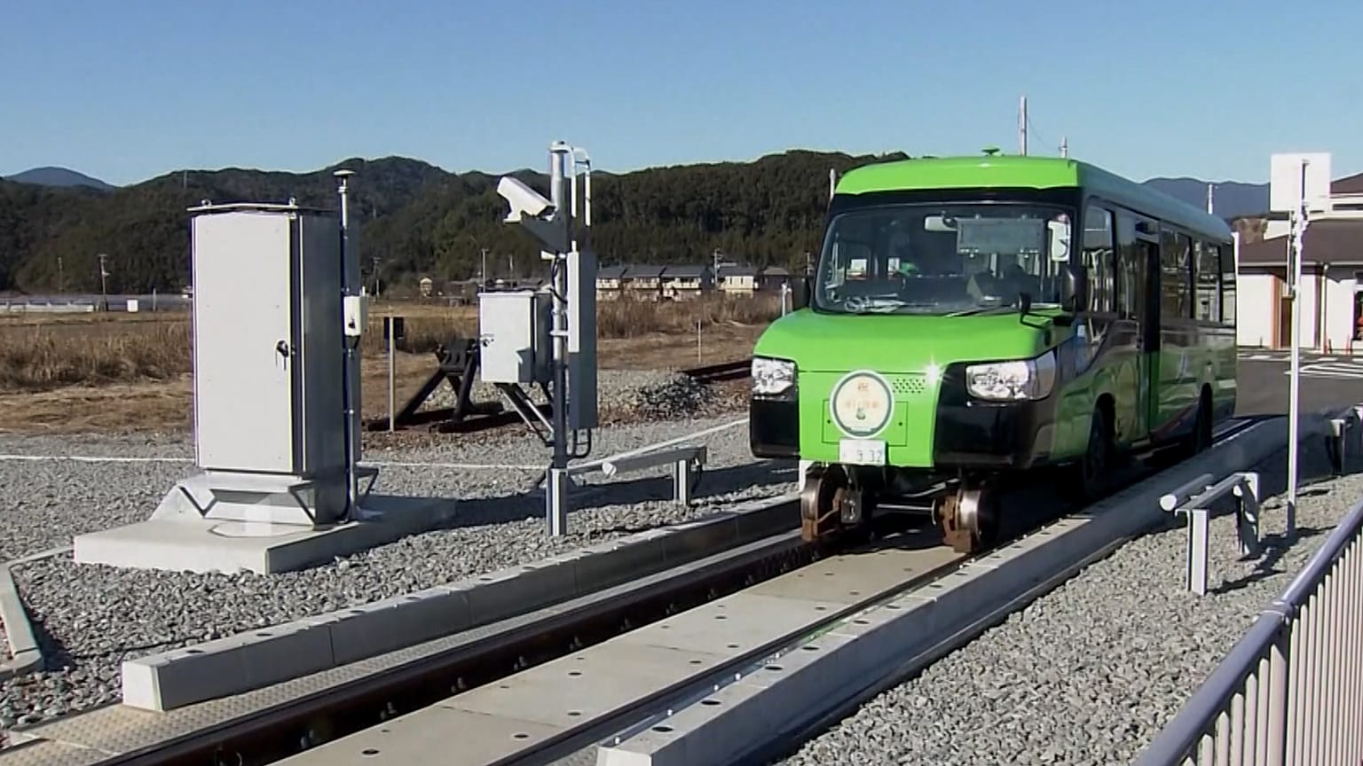 Image shows a 'Dual Mode Vehicle' that has just started operating in Japan.
