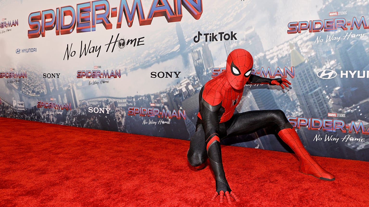 In this file photo taken on December 13, 2021, a fan in cosplay is seen at Sony Pictures' "Spider-Man: No Way Home" Premiere in Los Angeles, California. 