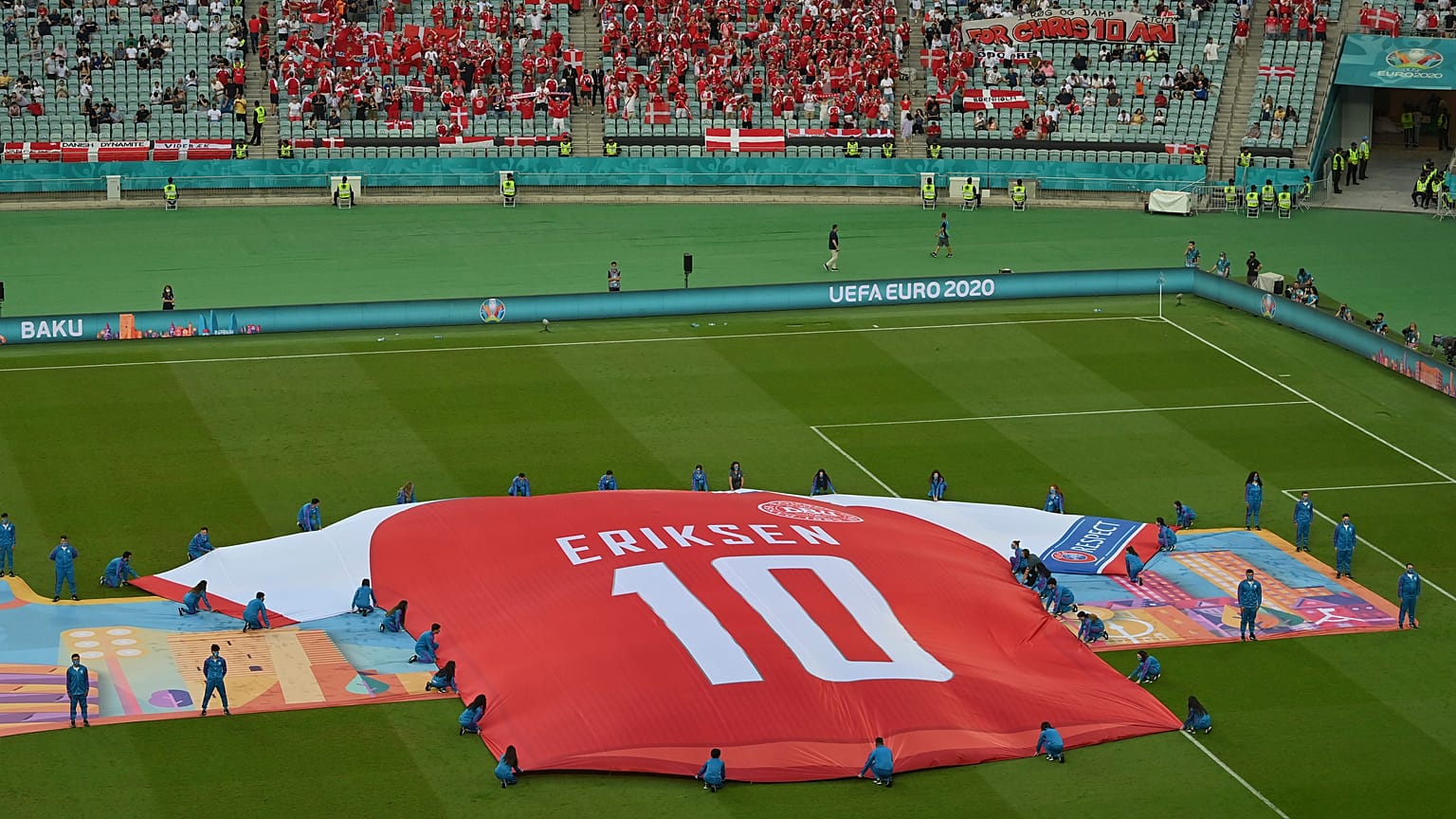 Denmark fans and players show their support for Christian Eriksen following his cardiac arrest at Euro 2020